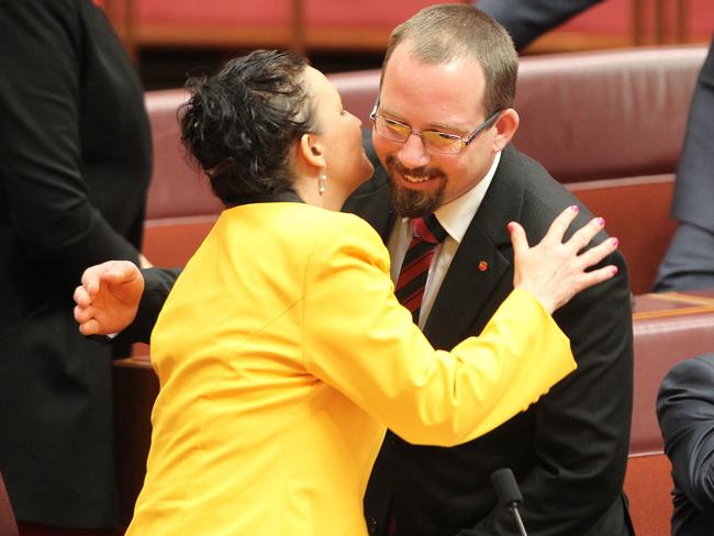 Backflips ... Senator Jacqui Lambie congratulates Motoring Enthusiasts Party Senator Ricky Muir after they were sworn in. Picture: Gary Ramage