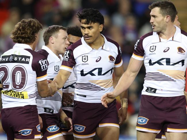 NEWCASTLE, AUSTRALIA - JULY 20: Brendan Piakura of the Broncos celebrates a try with team mates during the round 20 NRL match between Newcastle Knights and Brisbane Broncos at McDonald Jones Stadium, on July 20, 2024, in Newcastle, Australia. (Photo by Scott Gardiner/Getty Images)