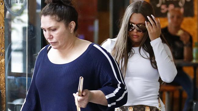 Roberta and Dhakota Williams leave a cafe after a visit to the Royal Commission on Friday. Picture: David Caird