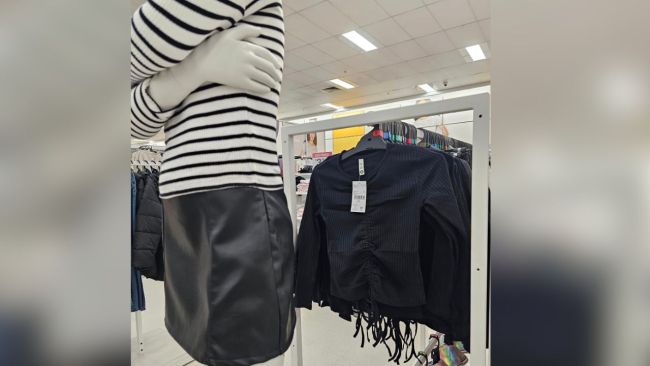 A mum has taken issue with the new range of kids clothing at Big W - particularly the leahter skirt and strappy top. Image: Facebook 