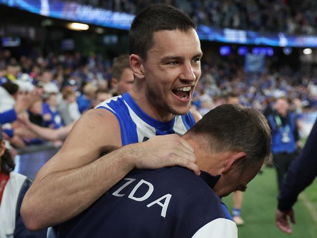 Luke Davies-Uniacke celebrates with coach Alastair Clarkson. Picture: Daniel Pockett/Getty Images