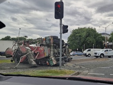 A concrete truck crashed and rolled onto its side on Queens Rd near King St narrowly avoided crushing other vehicles, according to witnesses. Picture: Eddy Lichtig