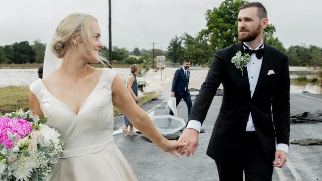 Kate Fotheringham and Wayne Bell reunited just in time for their big day in Wingham after flood waters threatened to ruin everything. Picture: Amanda Hibberd