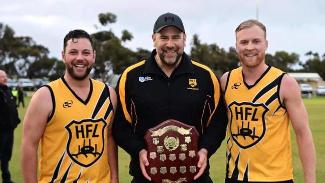 Hahndorf captain Sam Williams (left) with coach Matt Golding and teammate Sam Hayden. Picture: Mark Liebich