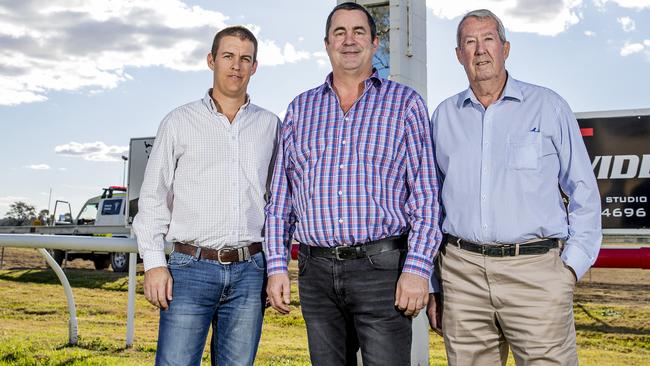 Brett Cook (middle) with Gold Coast Turf Club members Trent Watson and Arch McDonald. Picture: Jerad Williams