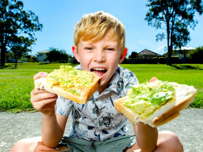 Eight-year-old Hudson Stewart of Carina with avocado on toast, Sunday, October 17, 2021 - Picture: Richard Walker