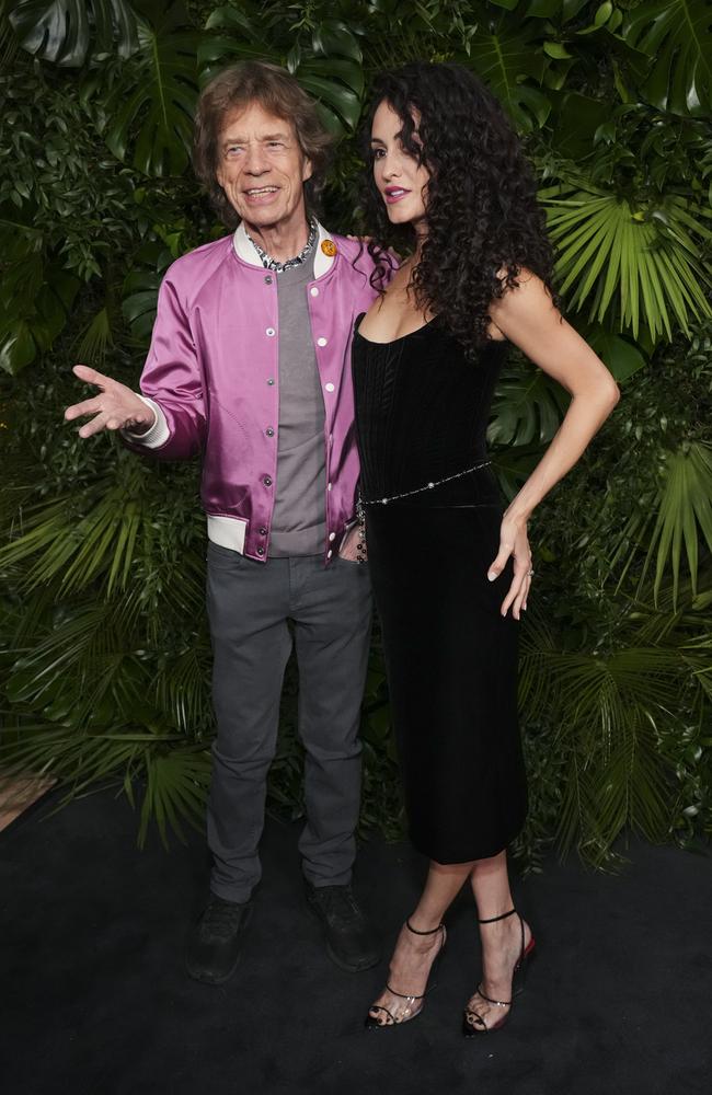 Mick Jagger and Melanie Hamrick arrive at Chanel's 16th Annual Pre-Oscar Awards Dinner on Saturday, March 1, 2025, at The Beverly Hills Hotel. Picture: Jordan Strauss/Invision/AP