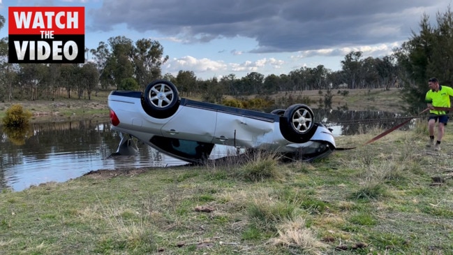 Car being pulled from Leslie Dam