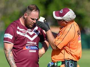 BATTLING ON: Fassifern player Ty Parker receives treatment during a recent game against Goodna. Picture: Rob Williams