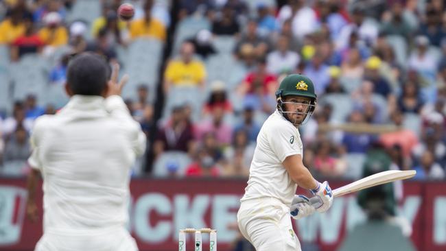 Aaron Finch watches the ball into Virat Kohli’s hands. Picture: AP