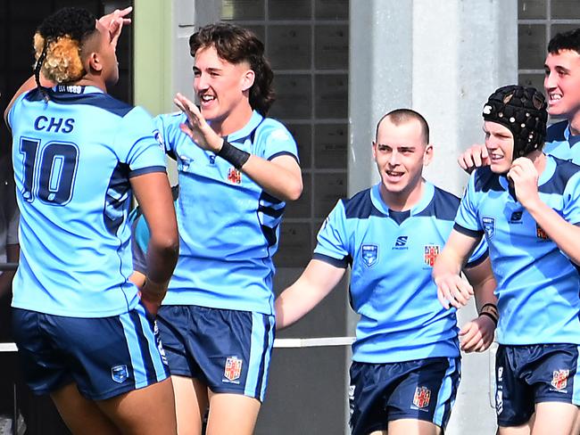 NSWCHS celebrate a tryNSWCIS Vs NSWCHS in the ASSRL national championships in Redcliffe.Saturday July 1, 2023. Picture, John Gass