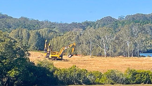 Two excavators were bogged at this Lendlease sewerage treatment plant site last week. The company has announced 740 jobs will be slashed. Picture: Contributed