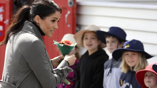 Meghan Markle greets children after a meeting young people from a number of mental health projects operating in New Zealand. Picture: AP