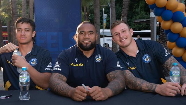 Daejarn Asi, Junior Paulo & J’maine Hopgood at the Parramatta Eels signing session on the Darwin Waterfront. Picture: Pema Tamang Pakhrin