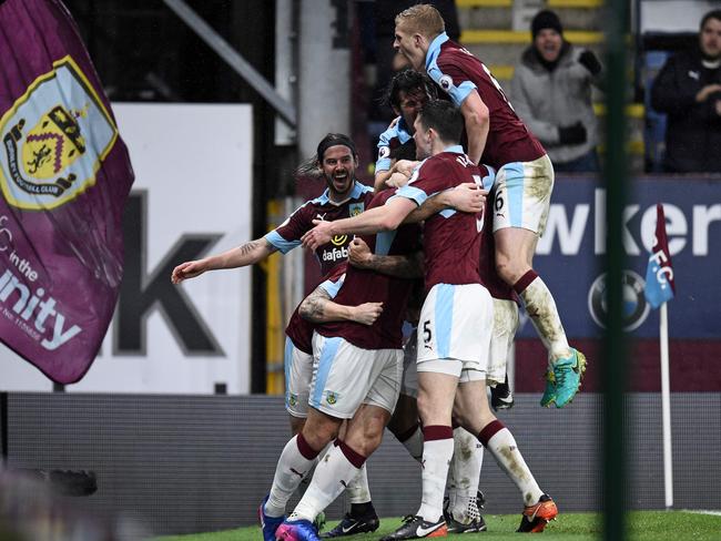 Sam Vokes celebrates with teammates after scoring.