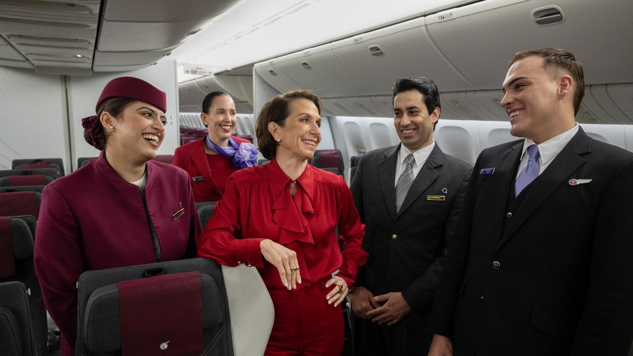 Jayne Hrdlicka, CEO of Virgin Australia, joins crew from both Virgin Australia and Qatar Airways on-board a Qatar Airways Boeing 777 at Brisbane Airport in December 2024. Picture: James D. Morgan/Getty Images