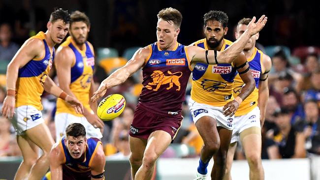 Lincoln McCarthy kicks the Lions into attack. Picture: Getty Images