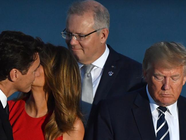 You two on the right, out of the way. Stop spoiling a good picture. This moment of Canada's Prime Minister Justin Trudeau and Melania during the G7 Summit in the town of Biarritz, France, sent the internet abuzz. No explanation needed. Picture: AAP