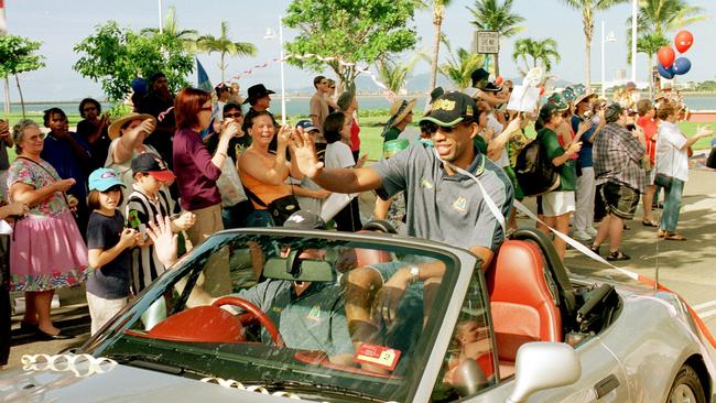 NBL PicMichael/Chambers. May 05 2001 Townsville Crocodiles Capt ROBERT ROSE leads procession along the /Strand in front of thousands of fans - parades sport basketball crowds NQ