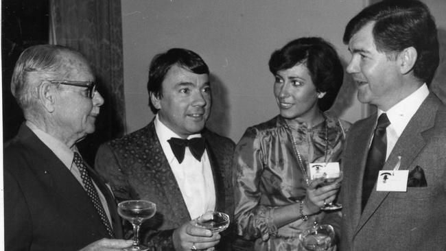 SA winemaker Wolf Blass and his wife Martine with George Fairbrother and Primo Caon at a function at Ayers House, North Terrace, Adelaide, May 1981.