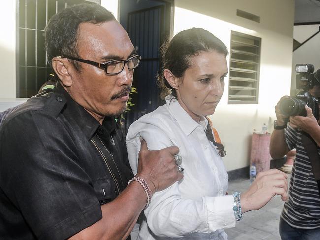 Sara Connor is escorted by police after attending her second trial at Denpasar Court, Bali, Indonesia, on November 16. Picture: AAP