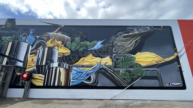 Gwada Murals artist Martin Jegou spray painted a huge goanna at the new Goanna Brewing venue at 2c Victoria St in 2024. Photo: Zoe Devenport