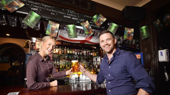 Myah from Mitre Tavern, pouring a beer for patron Shane Cremin. Picture: Nicki Connolly