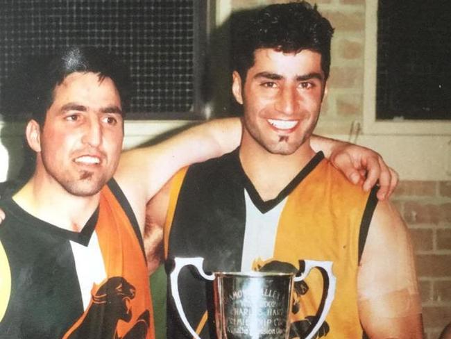 Joey and Matt Amad celebrate Northcote Park's 2000 DVFL grand final victory. Picture: Supplied