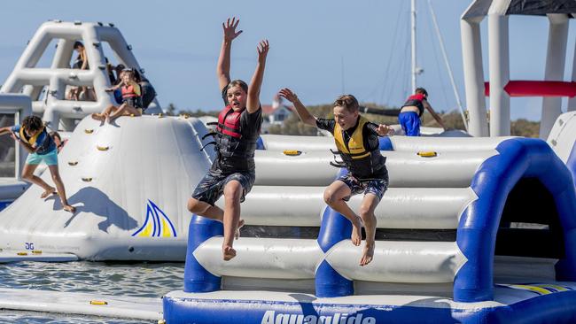 Zane Platt, 12, Bodhi Pryer, 12, at the GC Aqua Park, Southport. Picture: Jerad Williams