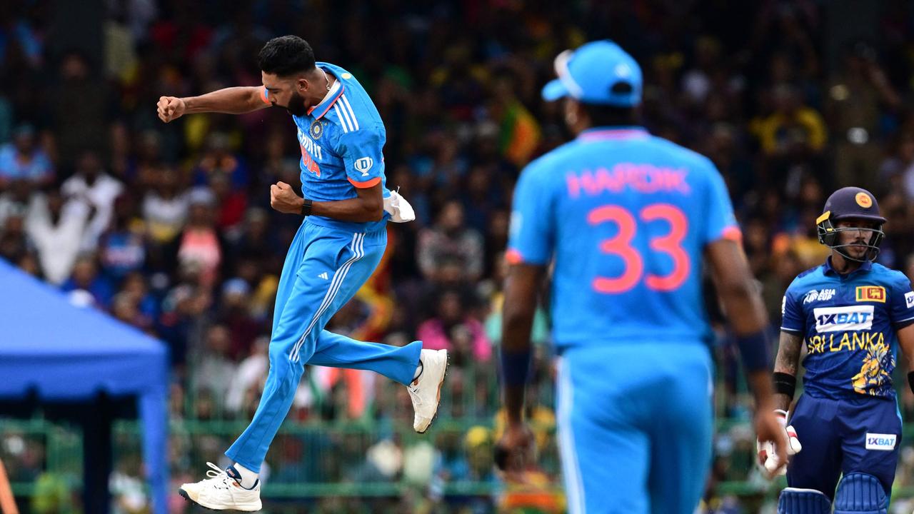 India's Mohammed Siraj celebrates after taking the wicket of Sri Lanka's Pathum Nissanka. Photo by Ishara S. KODIKARA / AFP