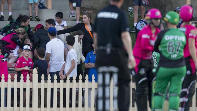 Play is halted as the spectator is treated on Saturday night.