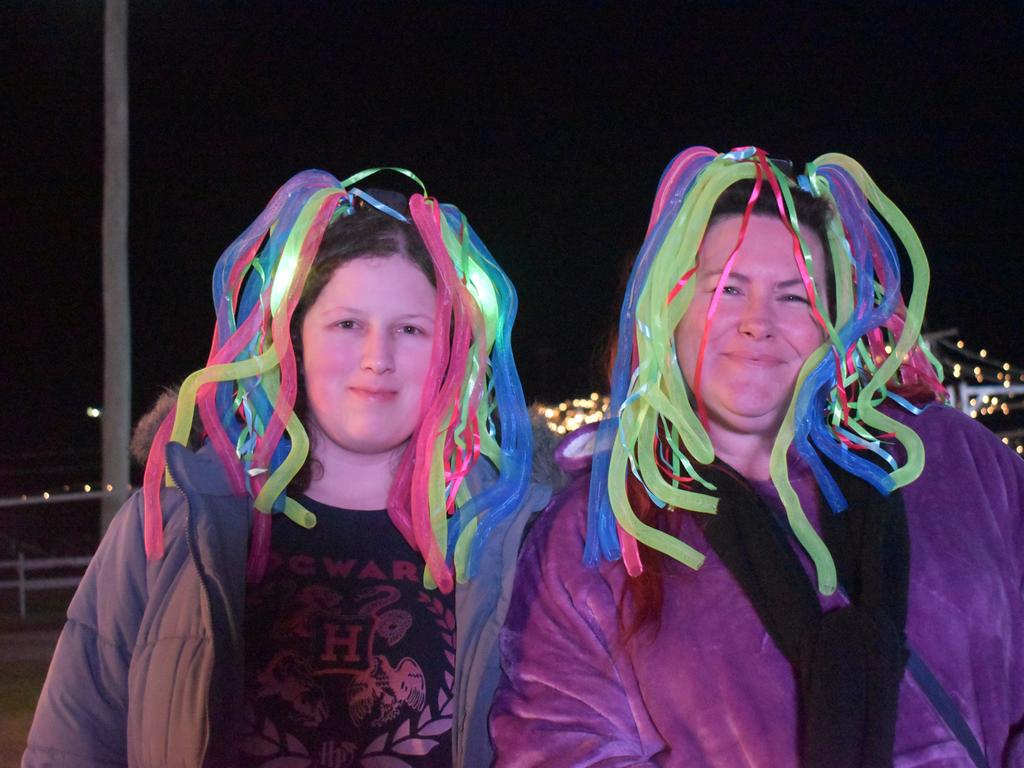 Laura Lumb and Katherine McPhail rocking some neon accessories at the 2021 Killarney Bonfire Night.