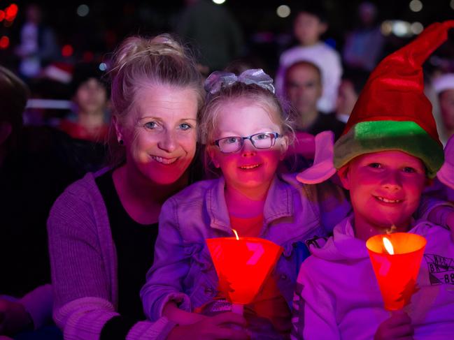 Flynn, Julia & Addisyn Morris pictured enjoying Carols in the DomainSaturday December 22 2018 (Image / Monique Harmer)
