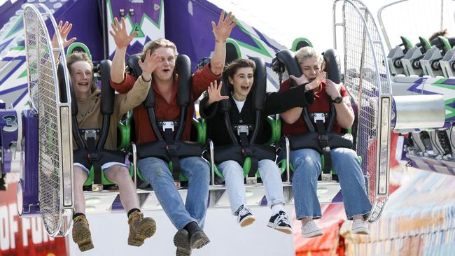 Royal Adelaide Show opens for 2024. Clint 14 and Leo 20 ride The Joker with Reporters Natalie and Jess. 30th August 2024. Picture: Brett Hartwig