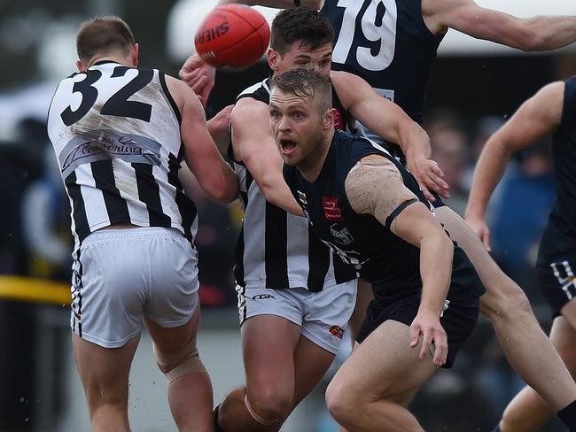 Berwick and Narre Warren lock horns in the AFL Outer East grand final. Picture: Josie Hayden