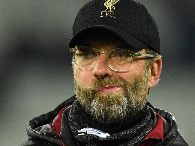 Liverpool's German manager Jurgen Klopp reacts ahead of the English Premier League football match between West Ham United and Liverpool at The London Stadium, in east London on February 4, 2019. (Photo by Glyn KIRK / AFP) / RESTRICTED TO EDITORIAL USE. No use with unauthorized audio, video, data, fixture lists, club/league logos or 'live' services. Online in-match use limited to 120 images. An additional 40 images may be used in extra time. No video emulation. Social media in-match use limited to 120 images. An additional 40 images may be used in extra time. No use in betting publications, games or single club/league/player publications. /