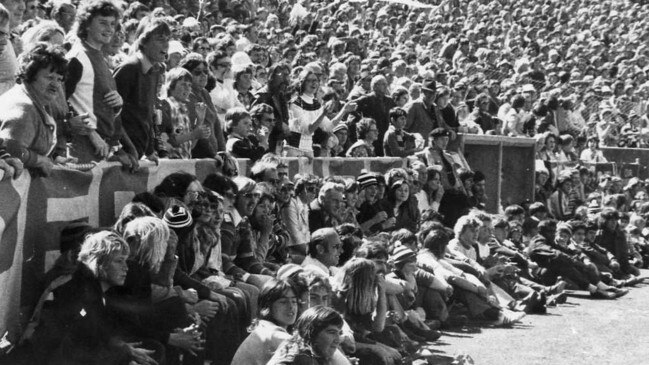 The crowd spilled over the boundary fence to watch the grand final between Sturt and Port Adelaide in 1976.  