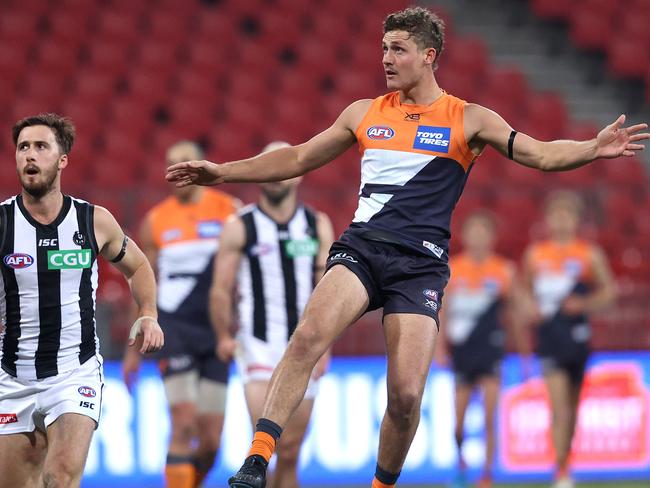 Harry Perryman kicks a goal against Collingwood in 2020. Picture. Phil Hillyard