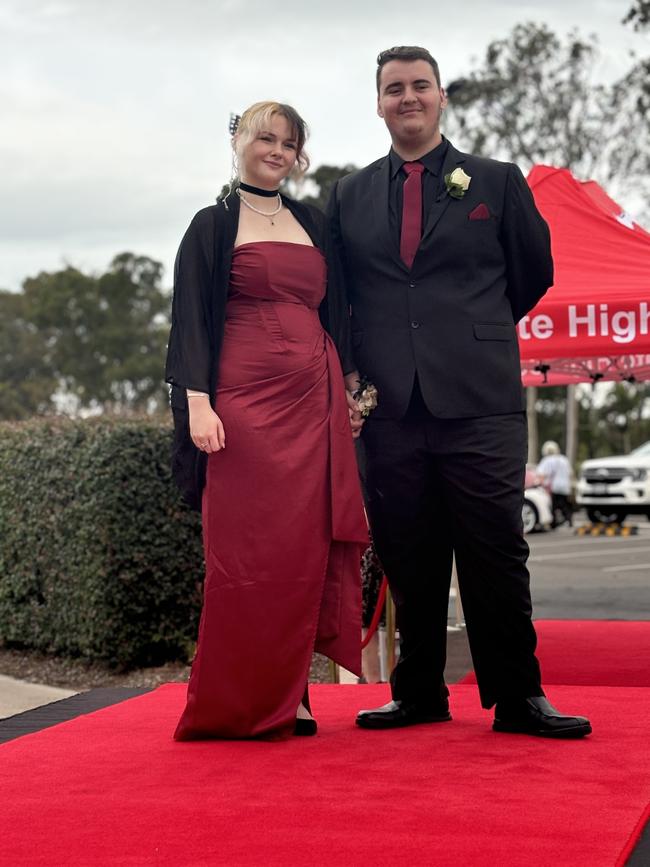 The students of Urangan State High School arriving at their formal.