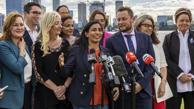 Labor candidates mark their election success on the South Perth foreshore. Picture: Colin Murty