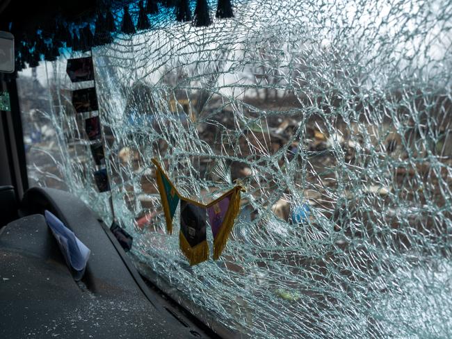 A window of a truck stands shattered in an industrial area in Kyiv following a morning missile strike that left 11 people dead and 11 injured. Picture: Getty Images