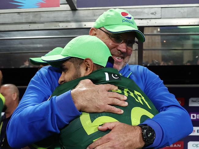 Babar Azam of Pakistan celebrates with Matthew Hayden after winning the ICC Men's T20 World Cup Semi Final match between New Zealand and Pakistan at Sydney Cricket Ground on November 09, 2022 in Sydney, Australia. (Photo by Matt King-ICC/ICC via Getty Images)