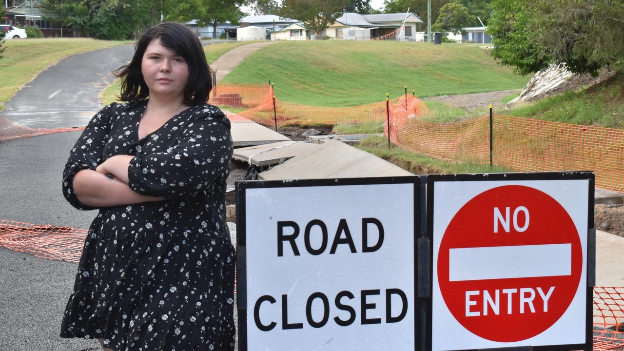 Jennifer Jackson said she was frustrated over the fact the road had still not been repaired, weeks after the floods. Photo: Elizabeth Neil