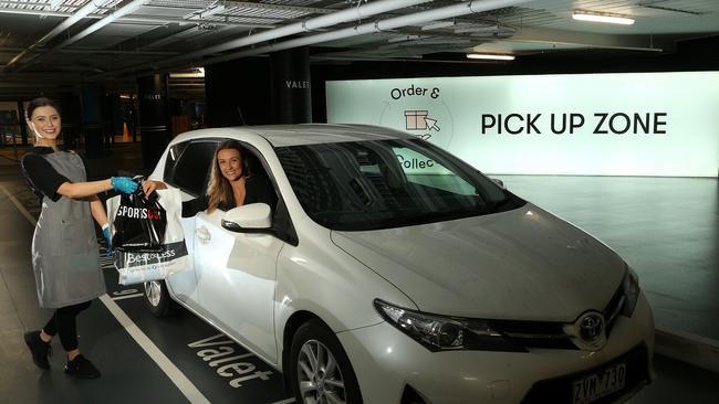 Ruby Collins cruises in to collect her shopping in Eastland’s new Order and Collect drive-through zone. Picture: Hamish Blair