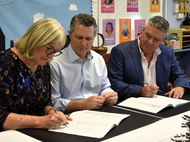 Chief Minister Eva Lawler, Federal Education Minister Jason Clare, and NT Education Minister Mark Monaghan sign the Better and fairer Schools Agreement for a billion-dollar funding commitment from the federal government. Picture: Sierra Haigh