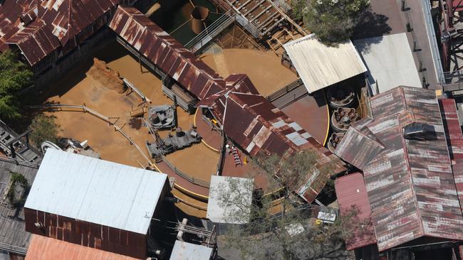 People visit memorial at the front of Dreamworld after four people lost their lives in a ride accident. The Thunder River Rapids Ride deserted. .   .. Picture Glenn Hampson