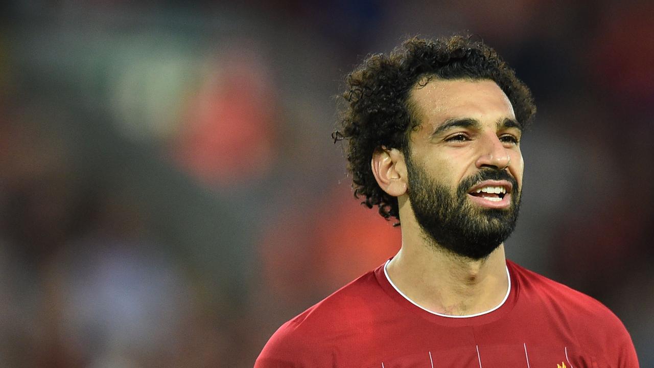 Liverpool's Egyptian midfielder Mohamed Salah scored in Friday’s opening-round win over Norwich, but he was equally impressive off the field the following day. (Photo by Oli SCARFF / AFP)