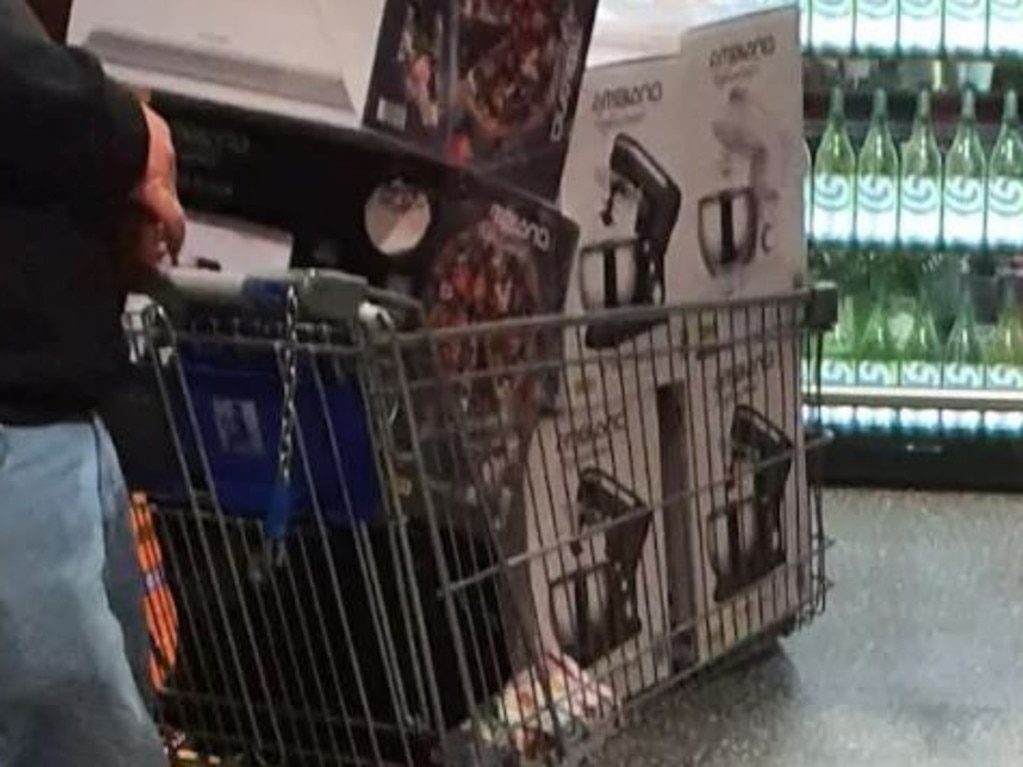 This photo of a man buying up big on Special Buys items went viral on Facebook in May.