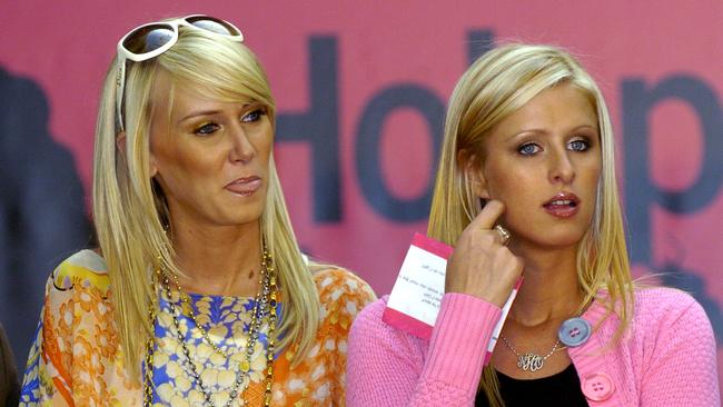 American pop celebrities Kimberly Stewart (left) and Nicky Hilton wait on stage before an autograph signing session a Chadstone in 2005.