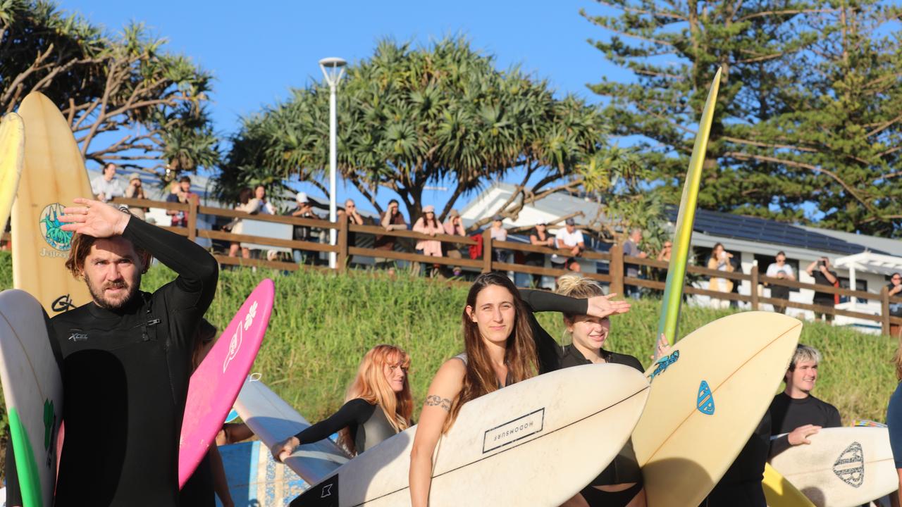 Members of the public took part in a paddle-out at Byron Bay's Main Beach to protest against the planned Netflix reality show Byron Baes on the morning of Tuesday, April 20, 2021. Picture: Liana Boss